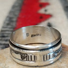 Close up of the artist's stamped signature