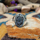 Sterling silver Thunderbird ring by Calvin Peterson with hand-stamped Southwestern detailing.