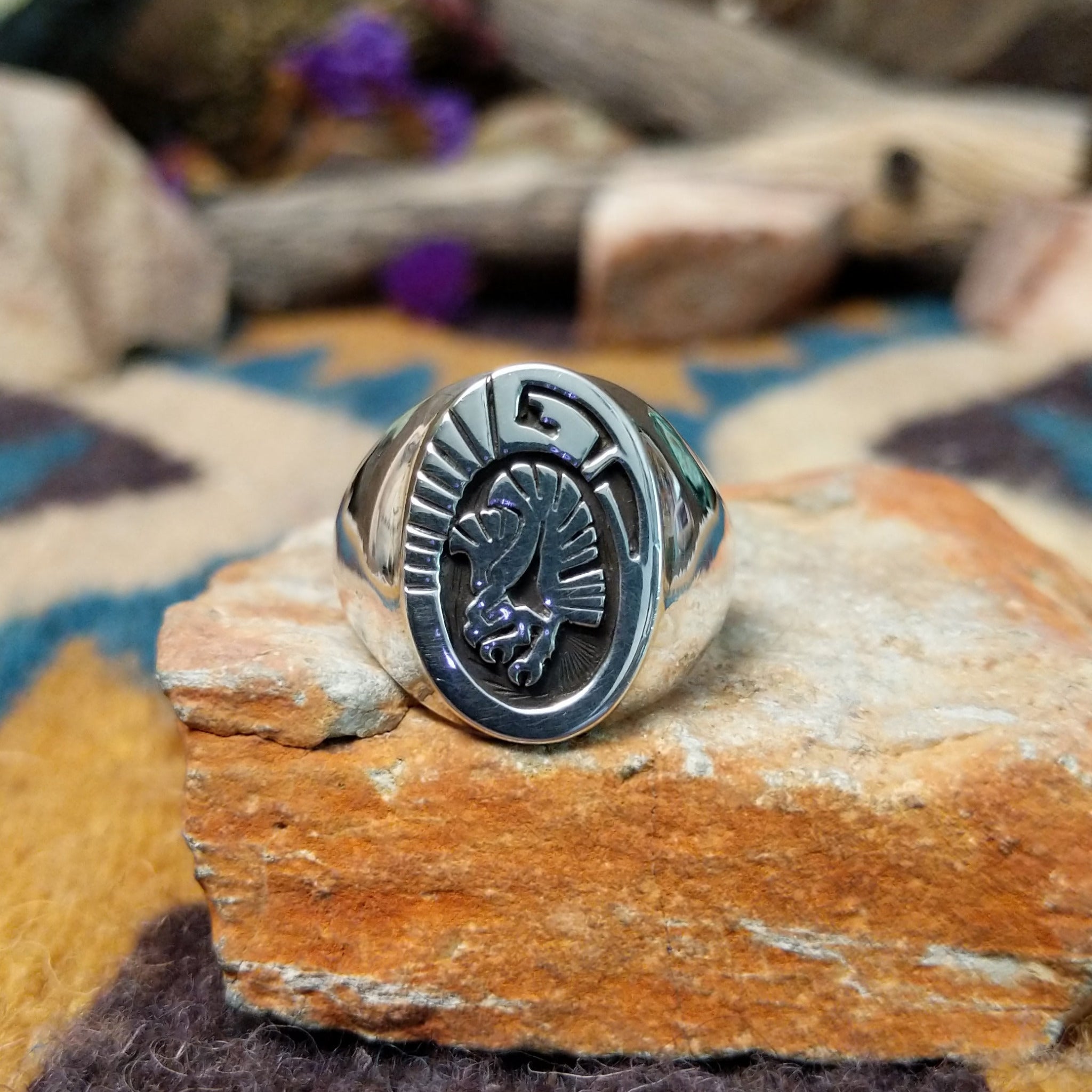 Sterling silver Thunderbird ring by Calvin Peterson with hand-stamped Southwestern detailing.