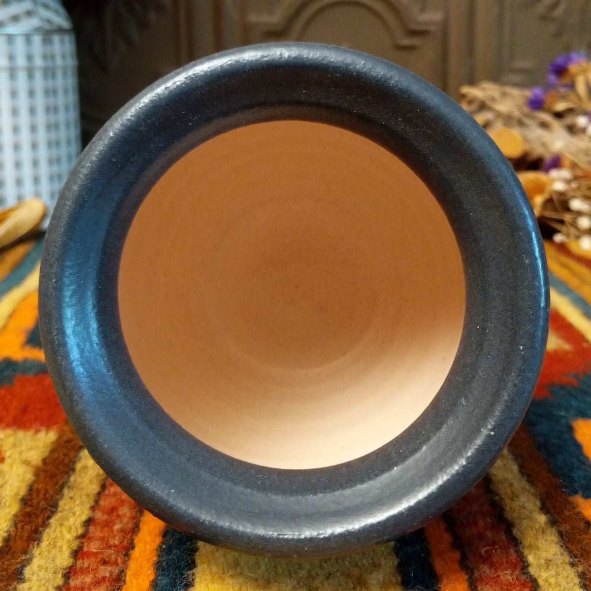 This distinctive Small Horsehair Pottery by Roger Calhoun features a tapered ceramic vessel with natural earth tones, black horsehair patterns, a decorative black-and-white crackled upper section, and a wide black rim; top view.