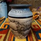 This distinctive Small Horsehair Pottery by Roger Calhoun features a tapered ceramic vessel with natural earth tones, black horsehair patterns, a decorative black-and-white crackled upper section, and a wide black rim.