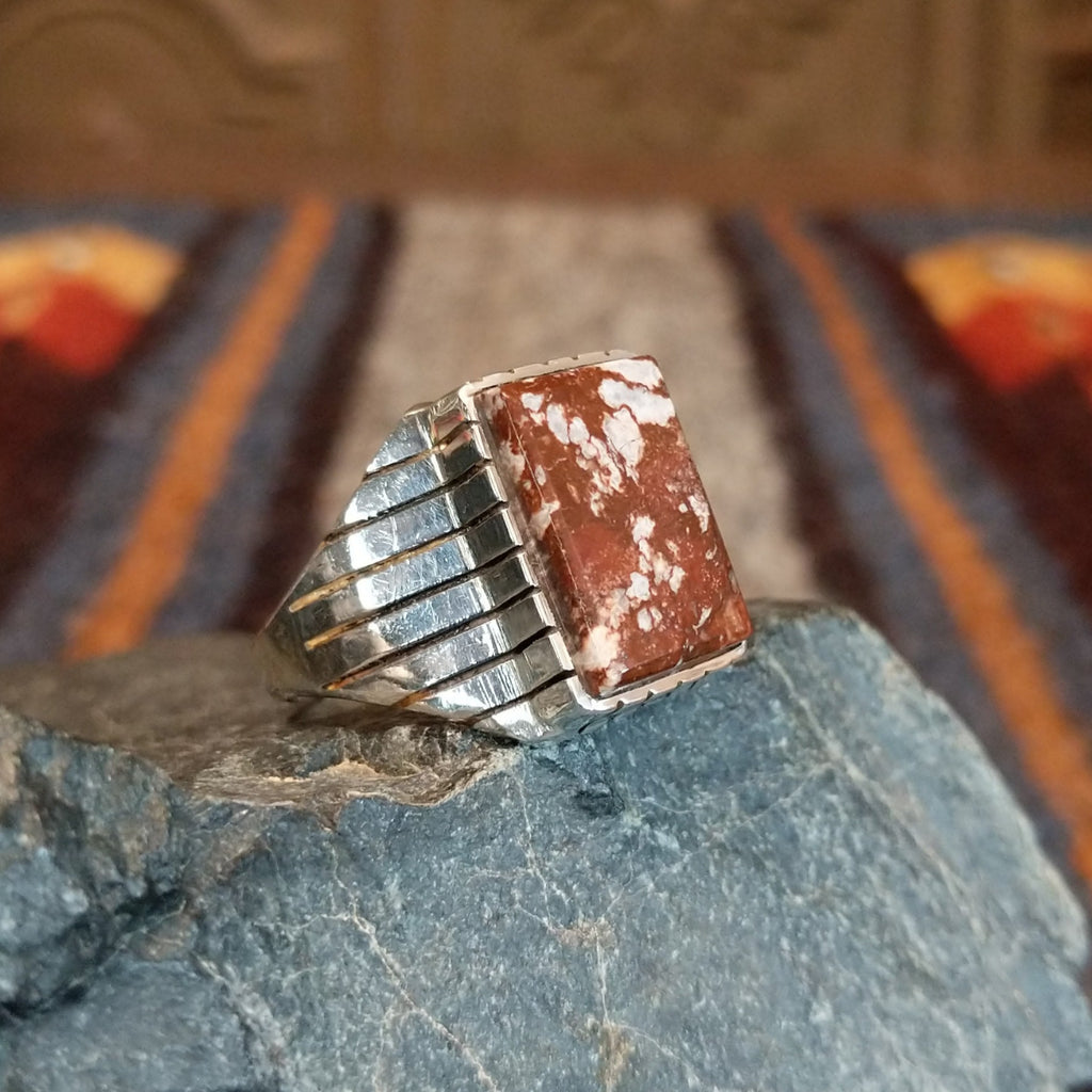 Small rectangular wild horse stone set in a sterling silver bezel and band with line work.