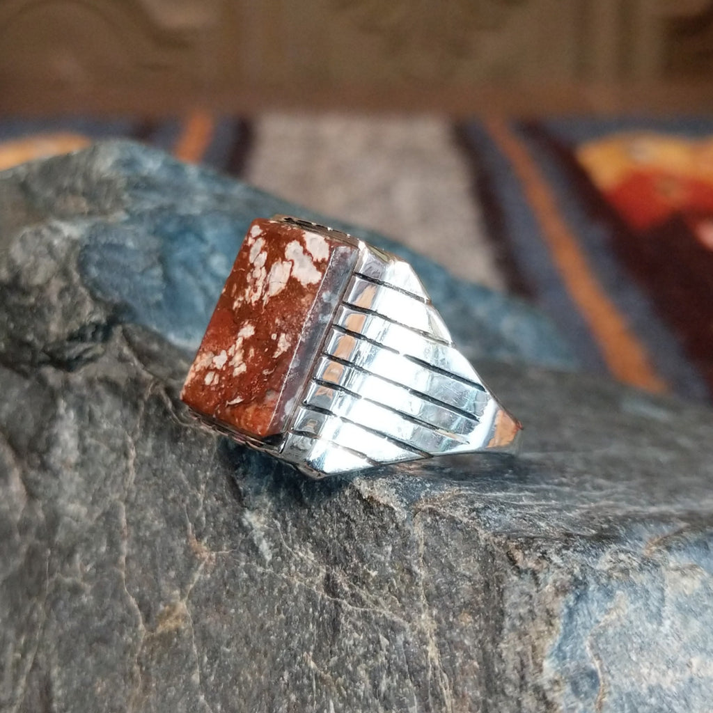 Small rectangular wild horse stone set in a sterling silver bezel and band with line work.