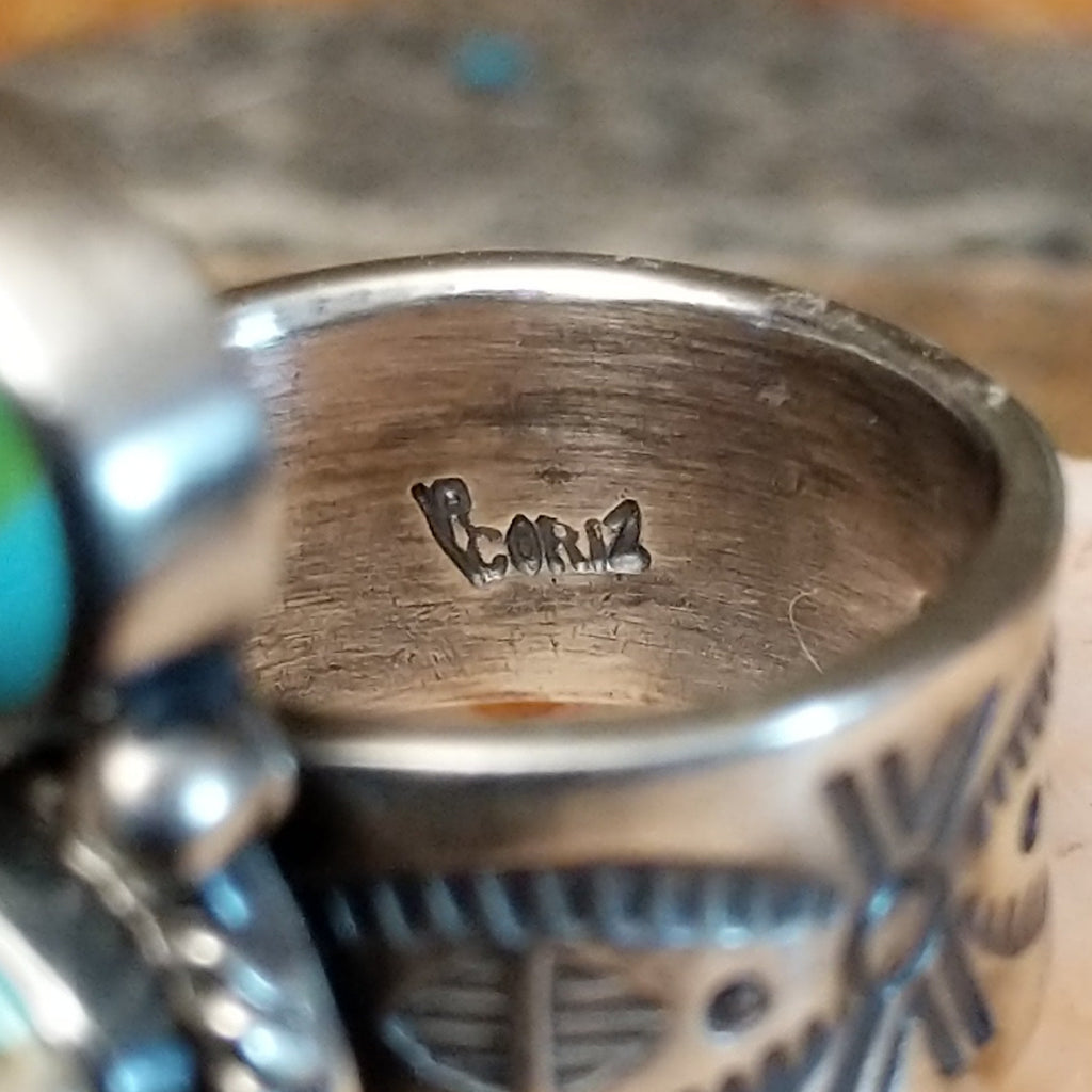 Close-up of Raymond Coriz's stamped signature.