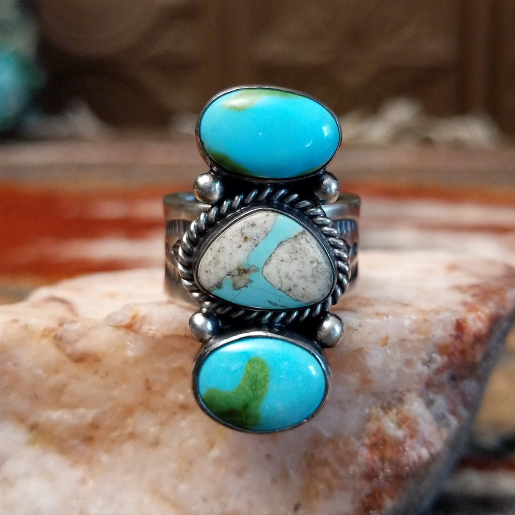 Sterling silver stacked ring with sonoran gold turquoise and boulder turquoise set in the bezels, featuring twisted rope and dotted accents.