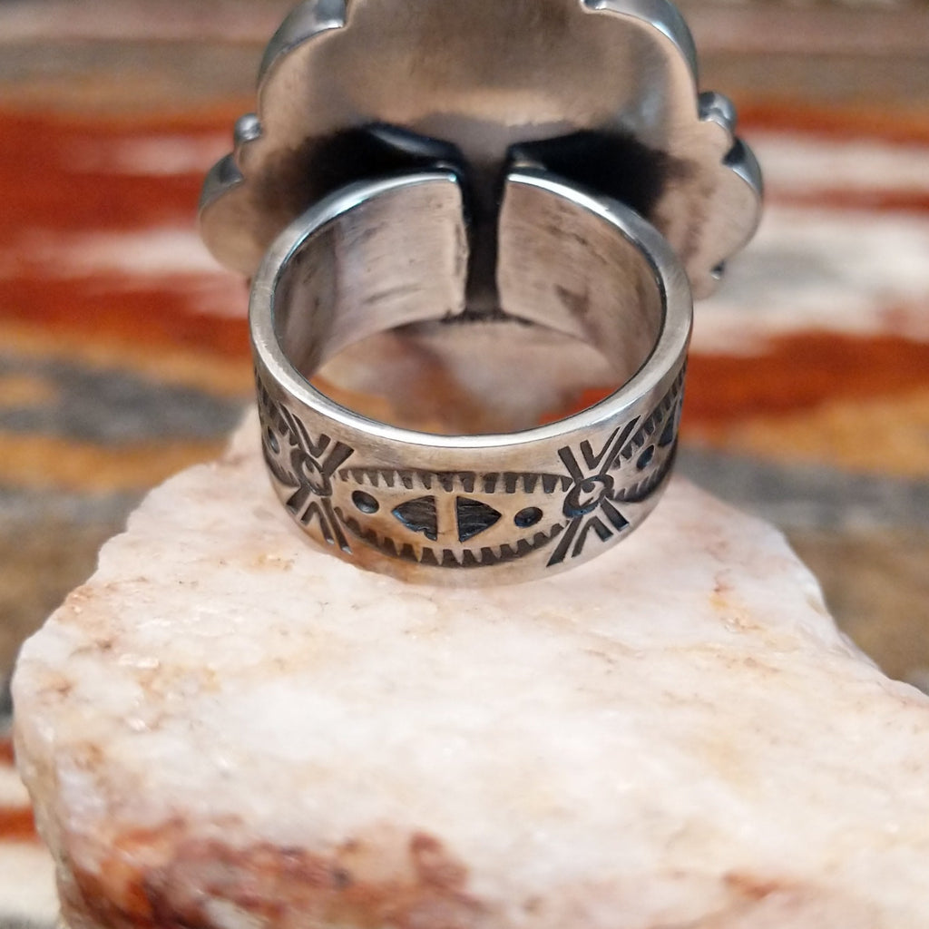 Close-up of the intricately stamped ring.