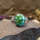 Sterling silver ring with Sonoran gold turquoise set in a round bezel.