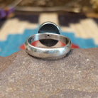 Sterling silver ring with Sonoran gold turquoise set in a round bezel.