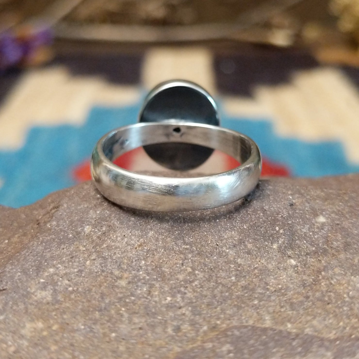 Sterling silver ring with Sonoran gold turquoise set in a round bezel.