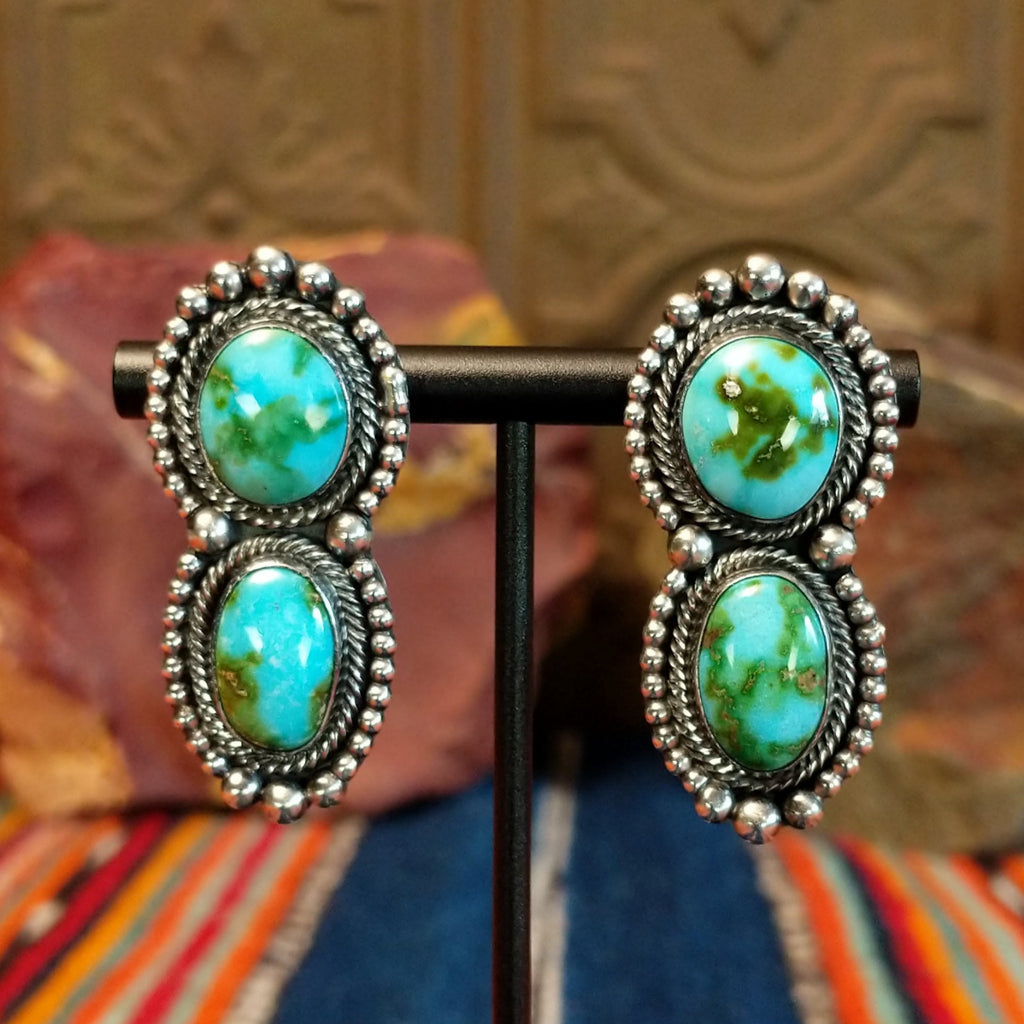 Sonoran Gold turquoise set in twisted rope bezels with intricate dot work on the pair of the earrings.