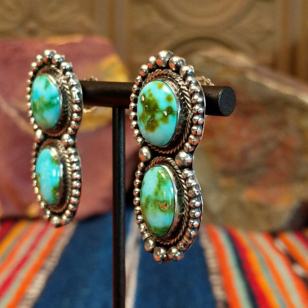 Sonoran Gold turquoise set in twisted rope bezels with intricate dot work on the pair of the earrings.