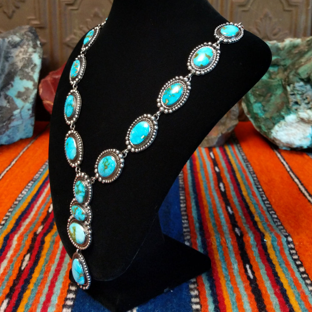 Sonoran Gold turquoise set in twisted rope bezels with intricate dot work linked together to form the necklace.