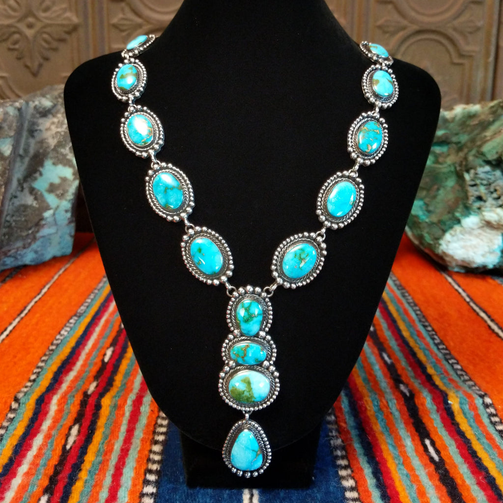Sonoran Gold turquoise set in twisted rope bezels with intricate dot work linked together to form the necklace.