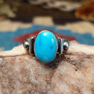 Sterling silver ring with Sonoran gold turquoise set in the raised bezel.