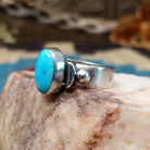 Sterling silver ring with Sonoran gold turquoise set in the raised bezel.