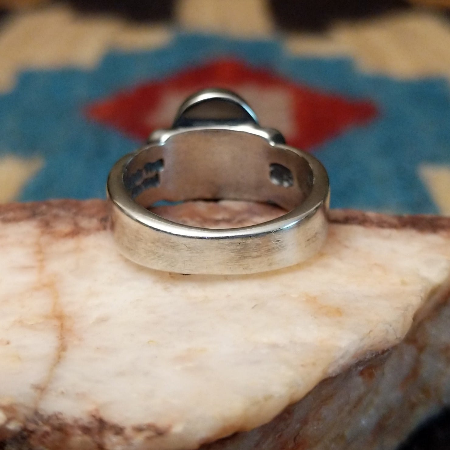 Sterling silver ring with Sonoran gold turquoise set in the raised bezel.