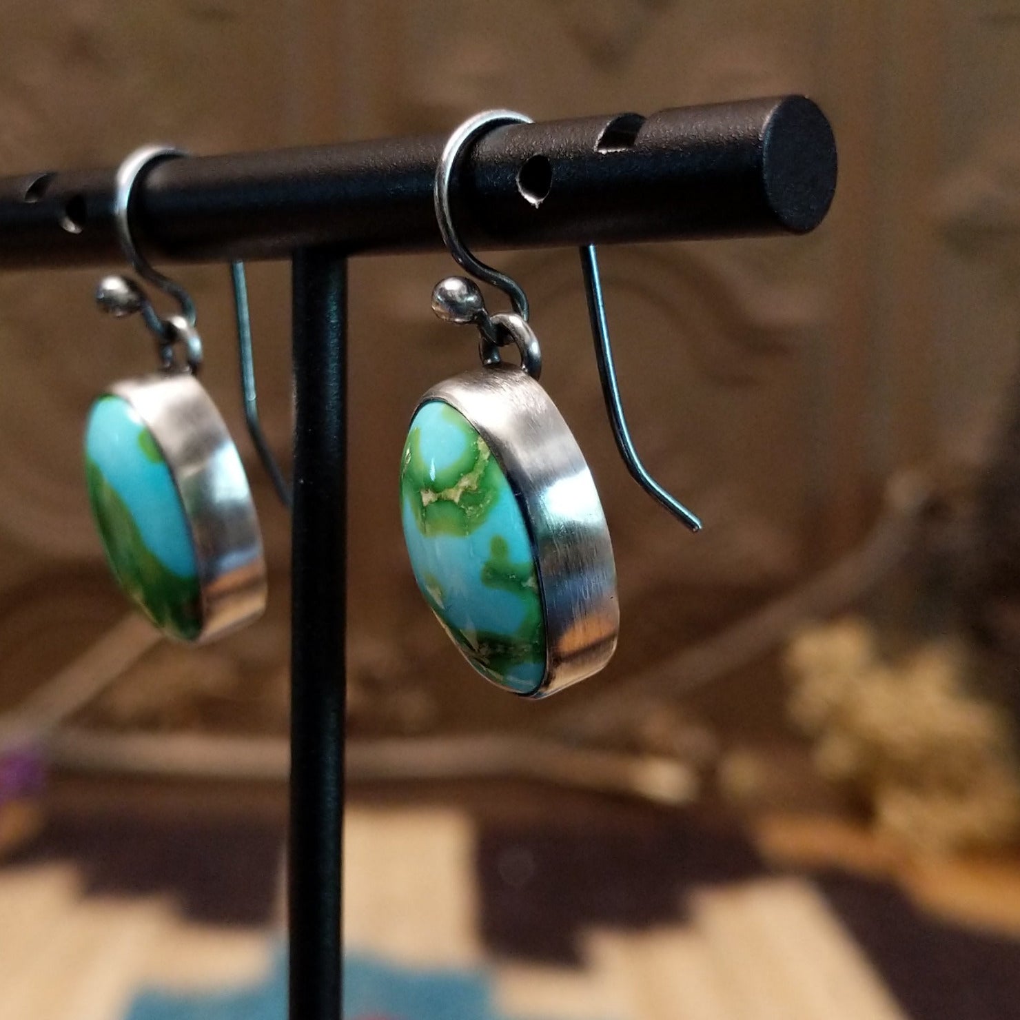 Sterling silver earrings with Sonoran gold turquoise set in bezels.