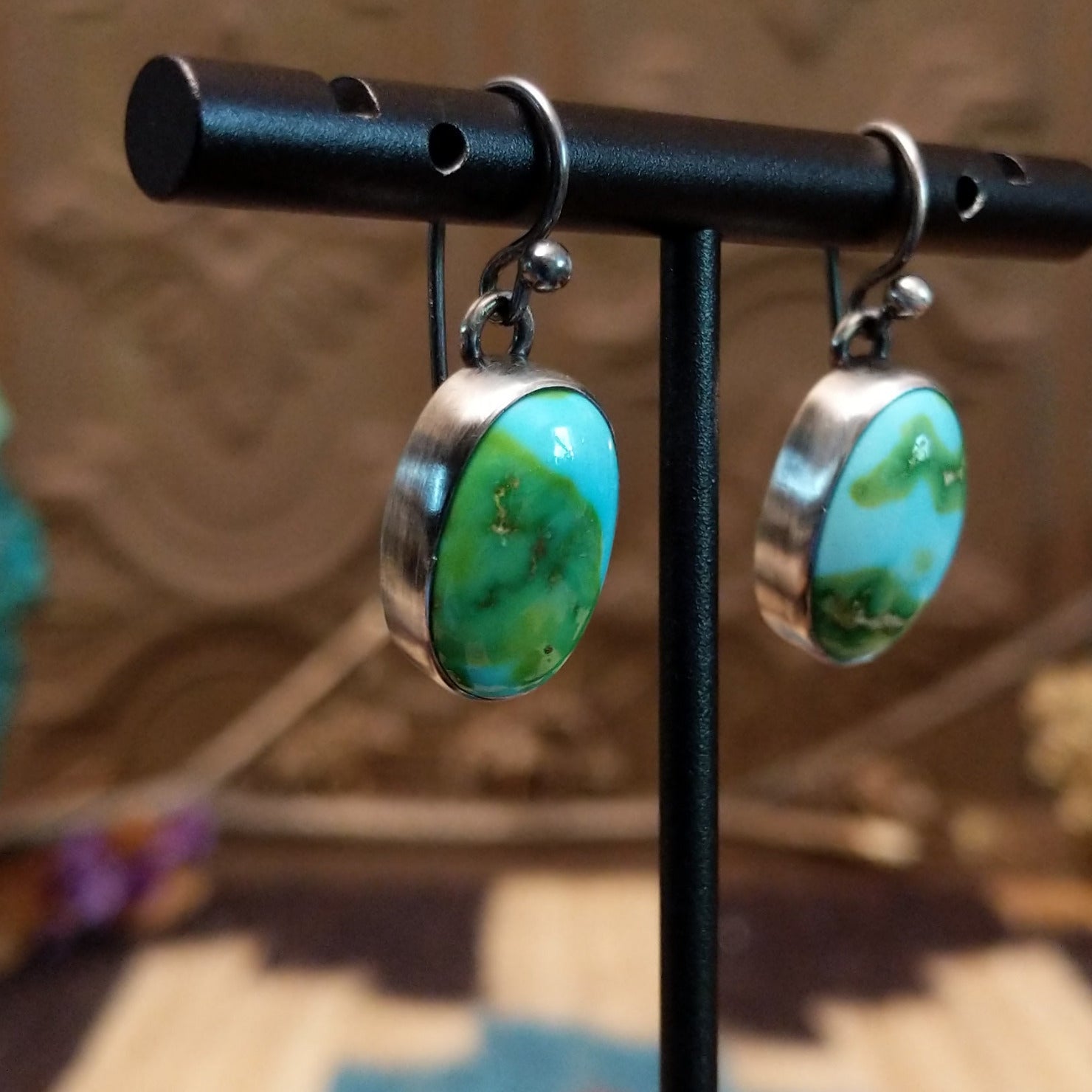 Sterling silver earrings with Sonoran gold turquoise set in bezels.