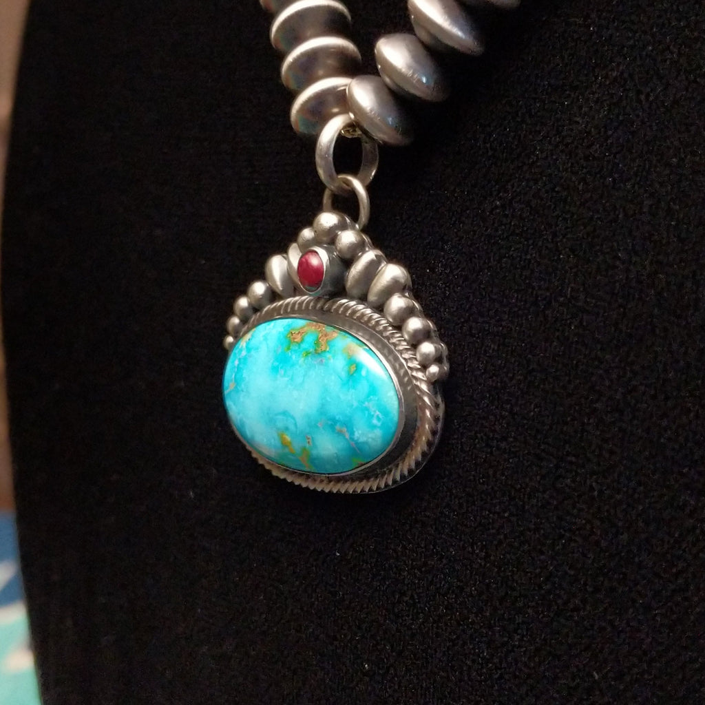 Sonoran Gold Turquoise and purple spiny oyster shell set in intricate setting with twisted rope accent and beaded sterling silver chain.