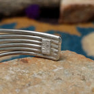 Handcrafted Navajo sterling silver five-strand cuff by Murphy Platero featuring an oval Sonoran Gold turquoise cabochon in a flowing open-wire design; artisan and Sterling Silver stamp.