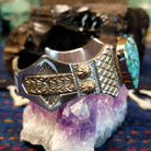 The intricate stamping on the side of the cuff.