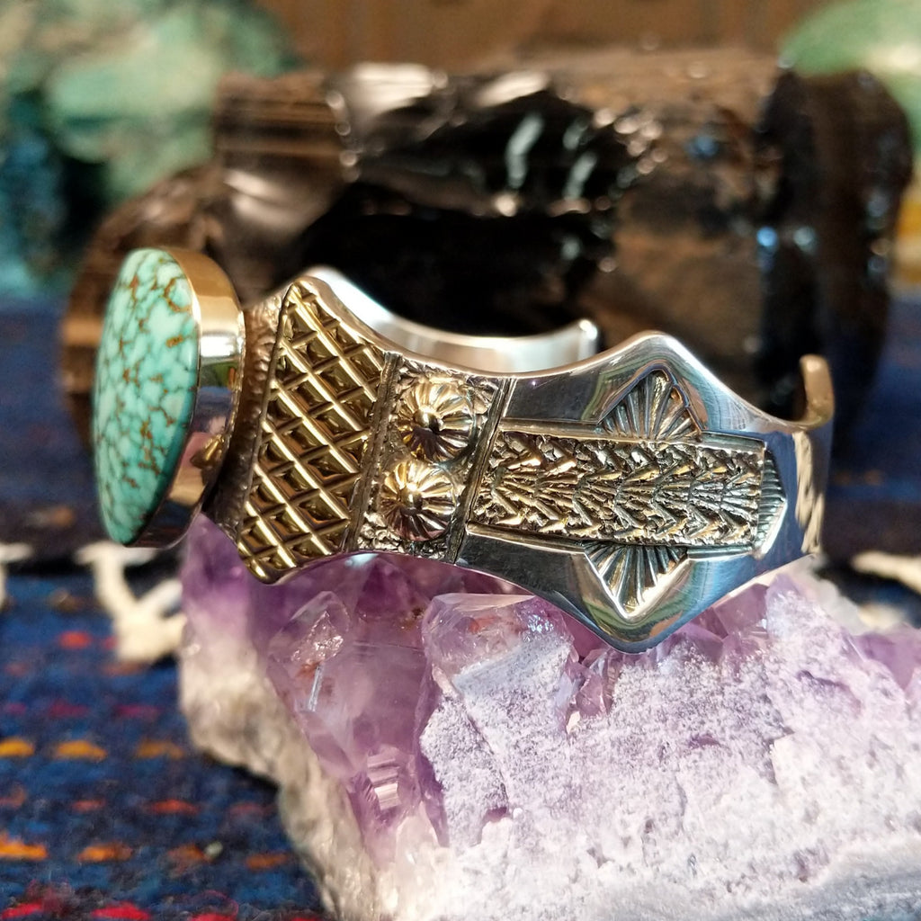 The intricate stamping on the side of the cuff.