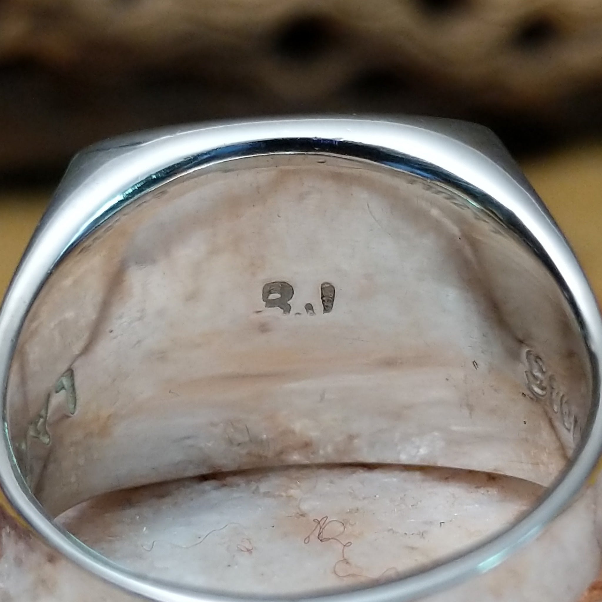 Square multistone inlay ring by Bernadine Joe, featuring a geometric arrangement of natural stones set in a handcrafted sterling silver band with traditional Southwestern-inspired craftsmanship.  Artisan and Sterling Silver stamp.