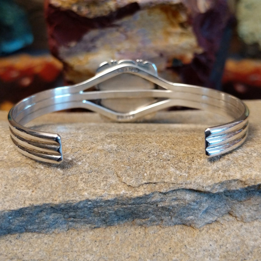 The back of the cuff showcases the polished band.
