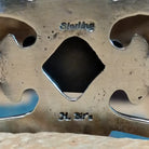 Close-up of the artisan's stamped signature.