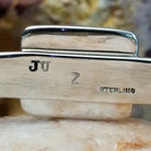 Close-up of the authentication stamp.