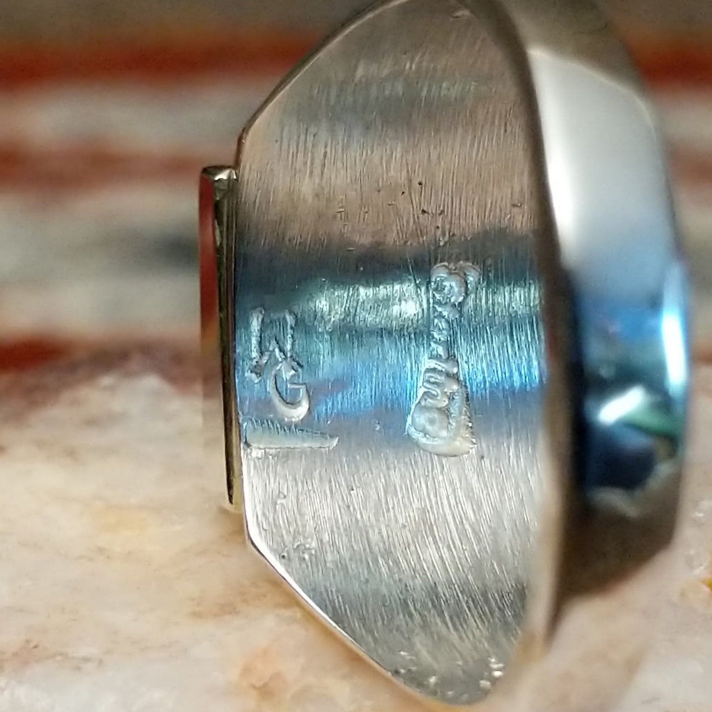 Close-up of the artisan's signature.