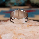 Sterling silver Navajo ring with lapis set in polished oval bezel.