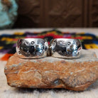 Stamped silver hoop earrings by Angela Martin.