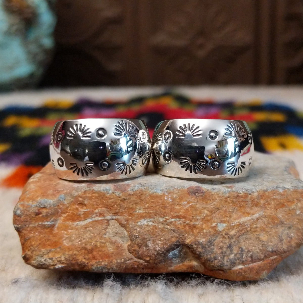 Stamped silver hoop earrings by Angela Martin.