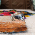 Stamped silver hoop earrings by Angela Martin.