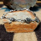 Sterling silver star link bracelet by Nabiho with handcrafted Southwestern star-shaped links.4