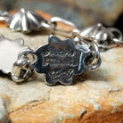 Sterling silver star link bracelet by Nabiho with handcrafted Southwestern star-shaped links; artisan, tribe, and Sterling Silver stamp.