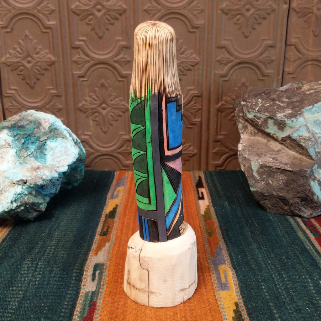 Shalako kachina featuring starry nights in a pueblo motifs and colorful, geometric designs.