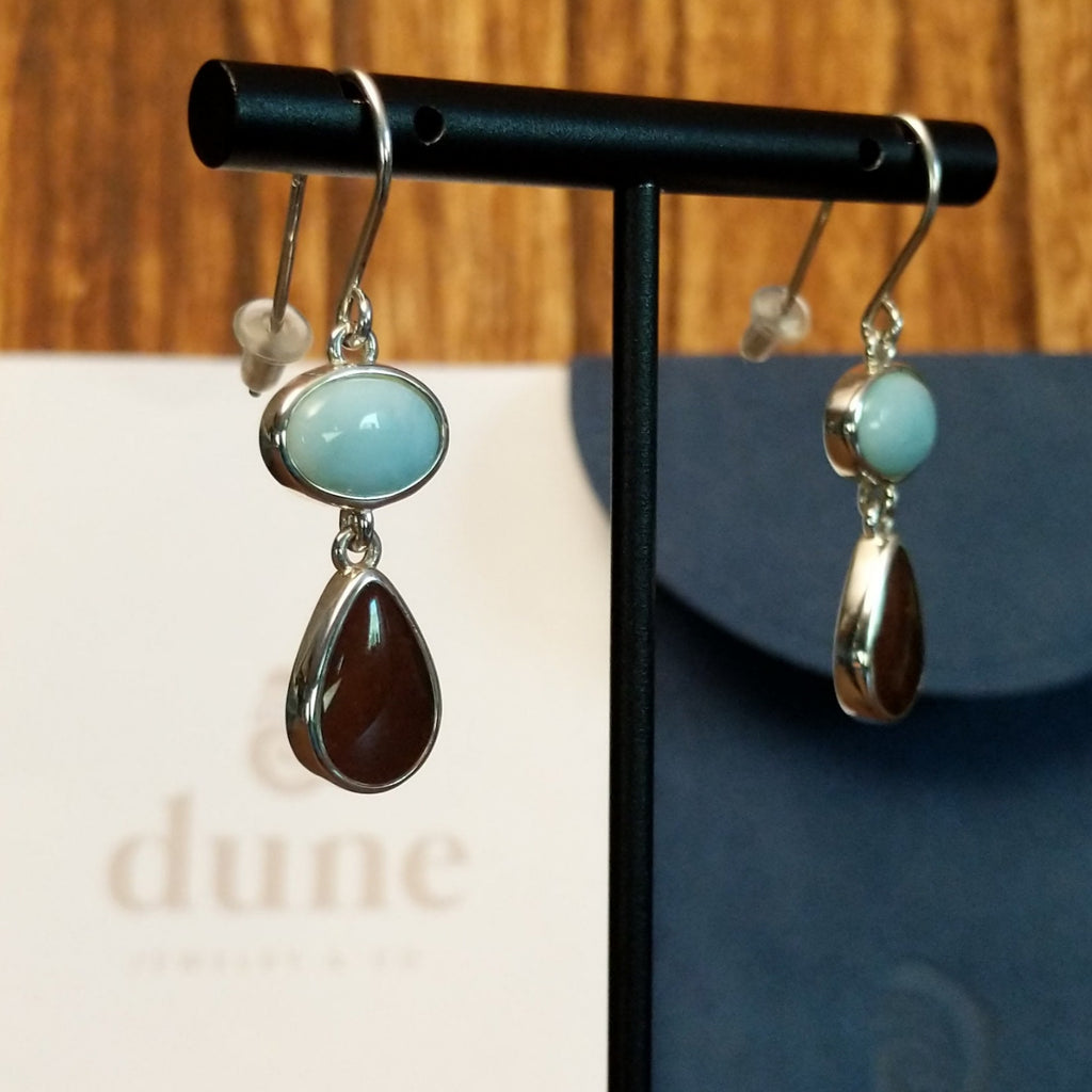 Larimar and Lake Powell sand set in sterling silver bezels of the dangle earrings.