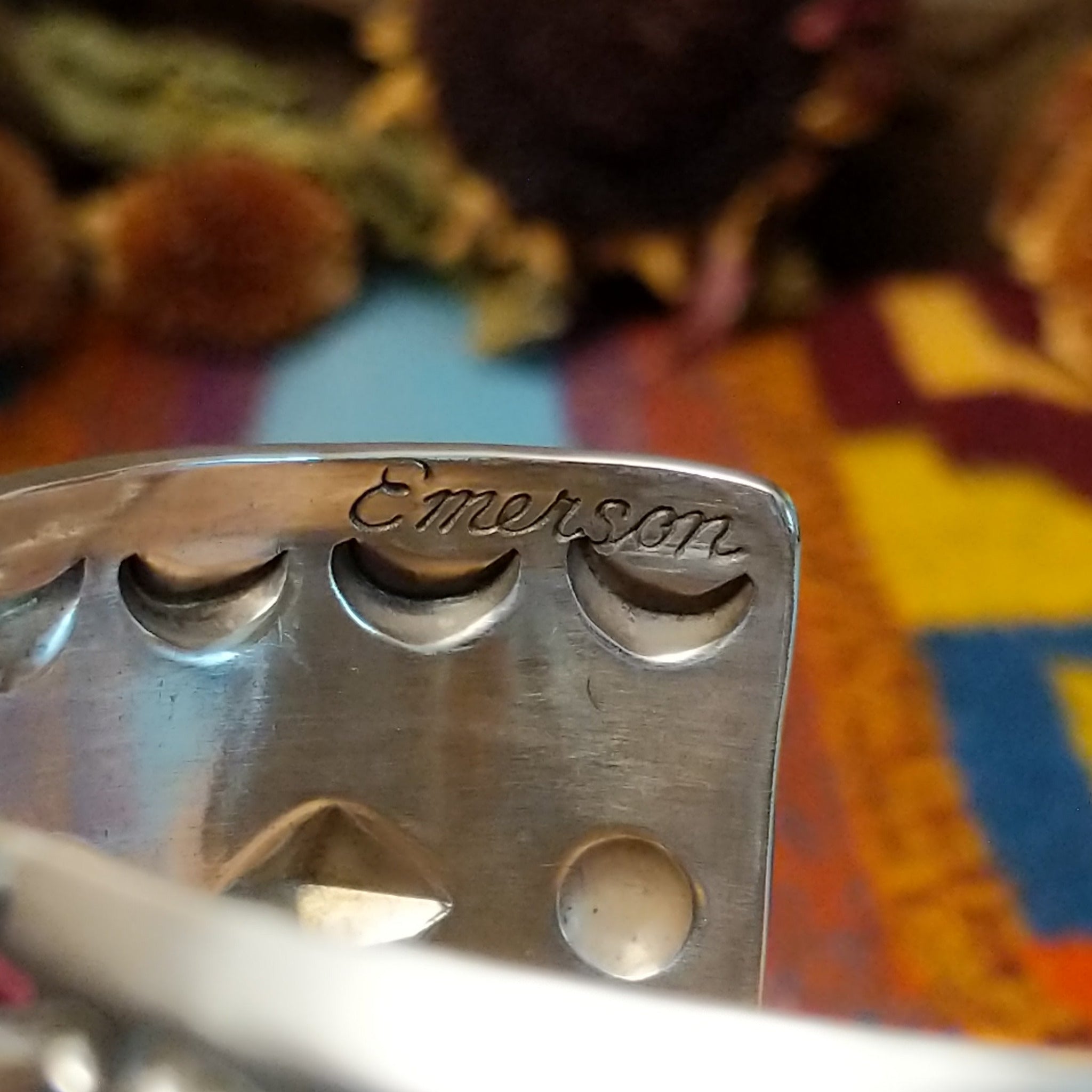 Close up of the artist's stamped signature