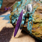 Sterling silver pendant with sugilite set in a navette bezel.