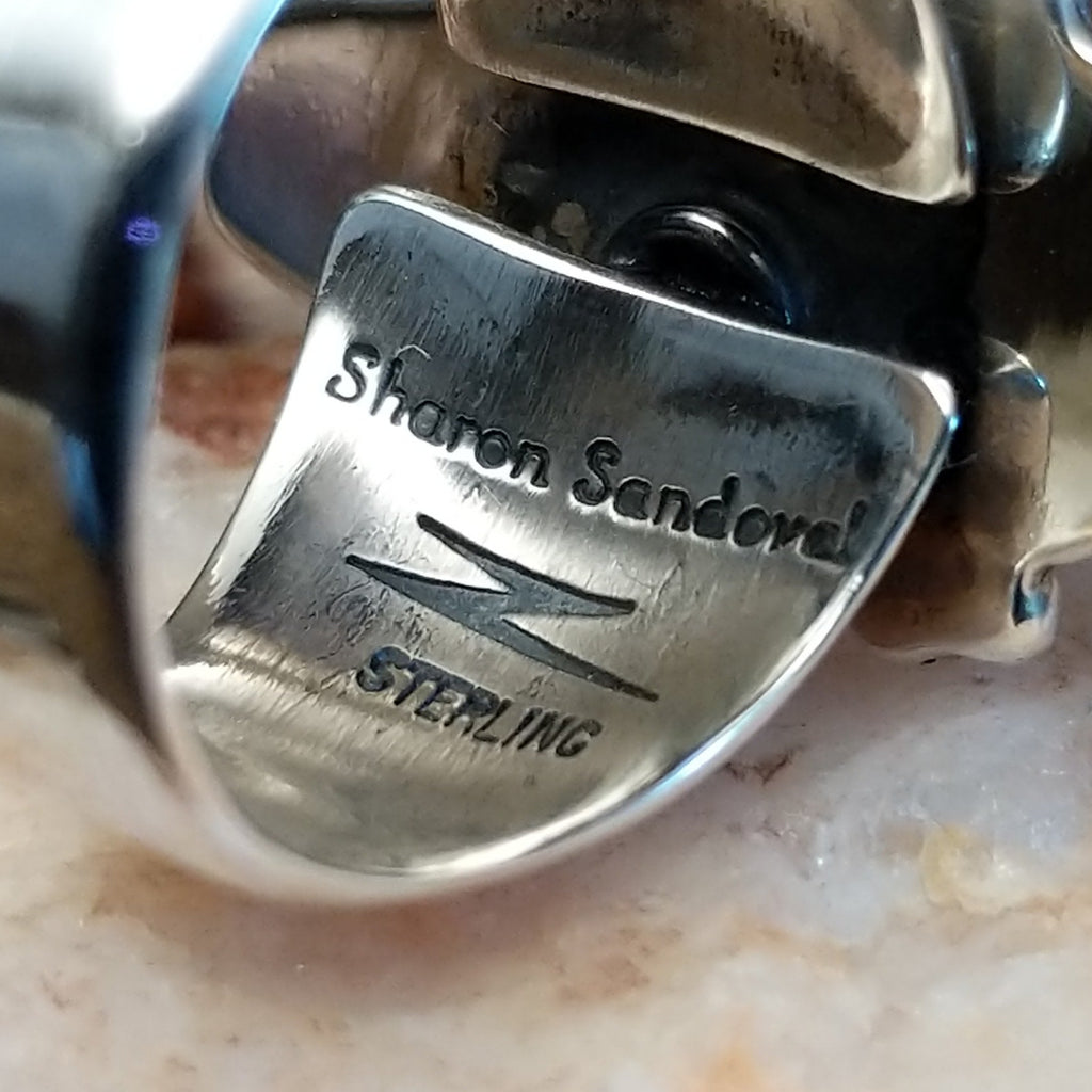 The stamp found on the interior of the ring.