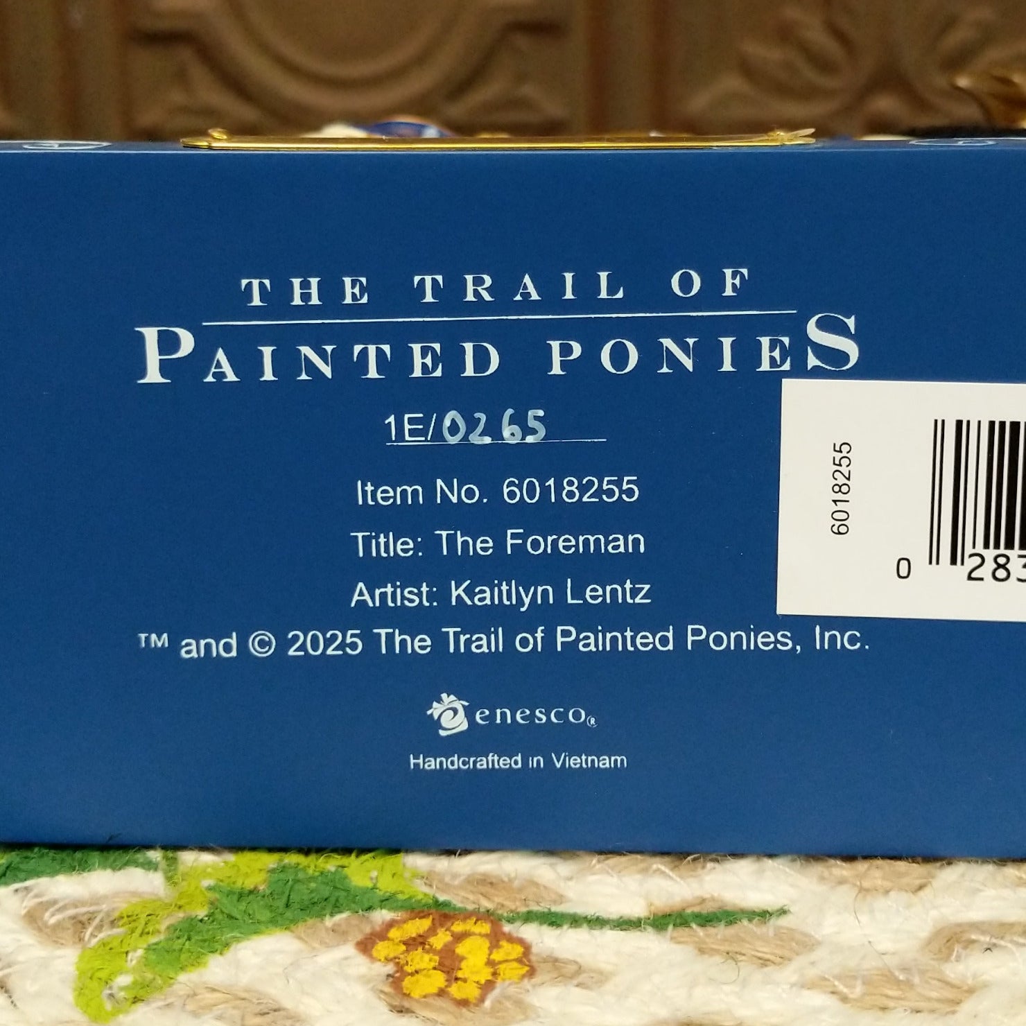 "The Foreman" collectible pony by The Trail of Painted Ponies, featuring detailed hand-painted Western-inspired artwork and ranching-themed design elements.  Production number.