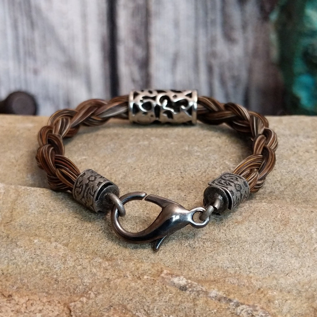 Close up of the metal clasp on the back of the bracelet.