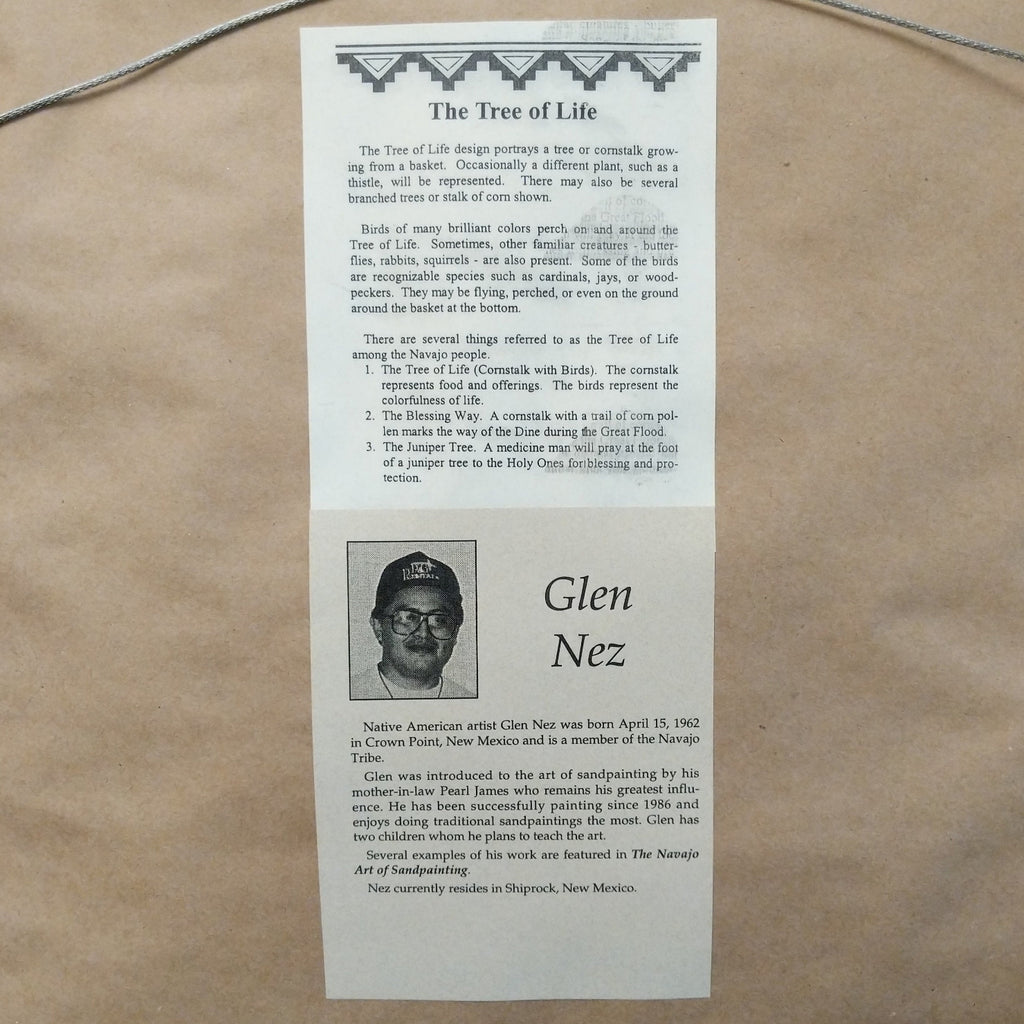A close-up of the artisan's authentication tag and information about the piece.