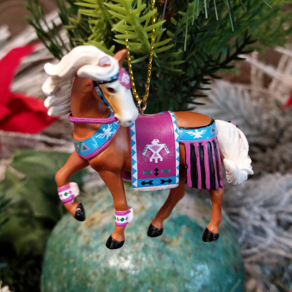 Resin made into a pony with Thunderbird motifs.