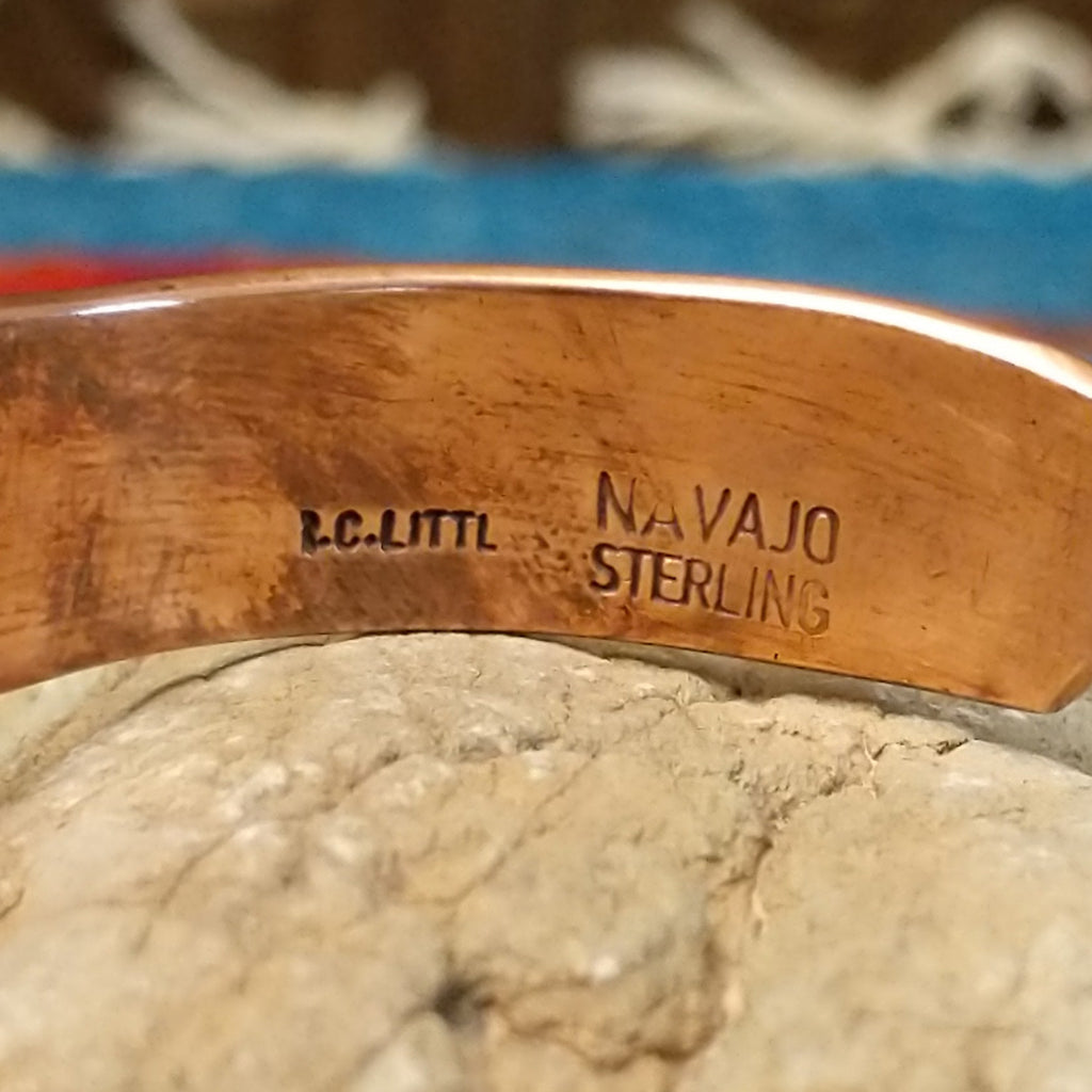 Close-up of the artisan's signature.