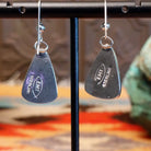 Close-up of the artisans stamped signatures.