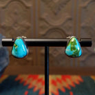 Sterling silver triangular post earrings with sonoran gold turquoise set in the bezels.