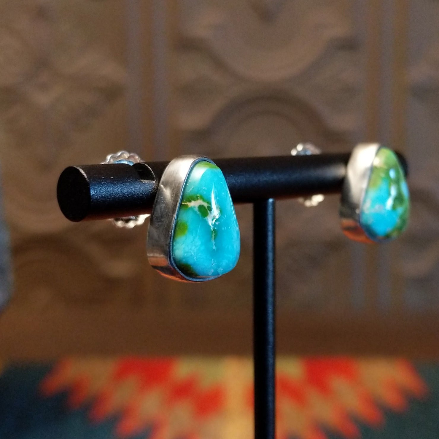 Sterling silver triangular post earrings with sonoran gold turquoise set in the bezels.